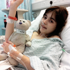 Amy recovering from ostomy surgery in hospital.