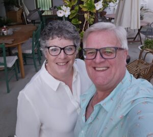 Keith and his wife smile for a selfie, celebrating life post-stoma!