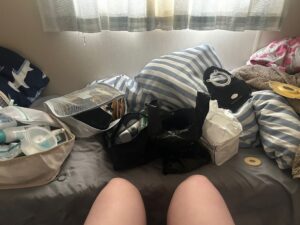 Rachel using packing cubes to store her stoma supplies when on her caravan holiday.